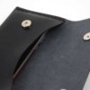 Pochette plate noire en cuir à mettre à la ceinture